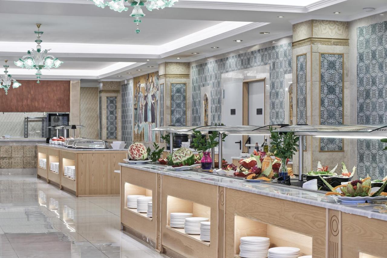 Kairaba Mythos Palace - Adults Only Kouspades Exterior photo A buffet at a hotel